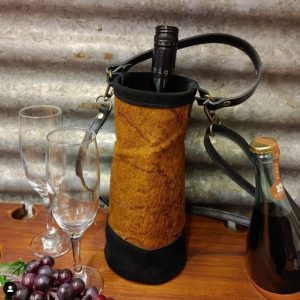 Tan lamb leather teamed with black Wine Carrier by Purselane